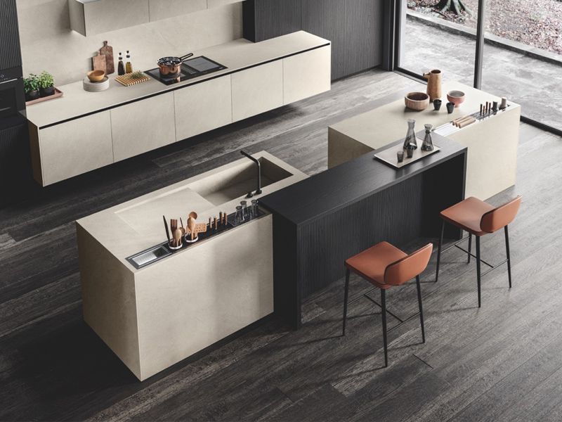 Cucina Sistema con basi in sospensione ed un isola dalla forma originale. Finitura a scelta L 300 per la parete , isola L380 PREZZO SU RICHIESTA Immagine solo indicativa - possibilità di creare secondo esigenze personali  PREVENTIVO SU RICHIESTA