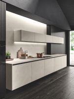 Cucina Sistema con basi in sospensione ed un isola dalla forma originale.<br />Finitura a scelta<br />L 300 per la parete , isola L380<br />PREZZO SU RICHIESTA<br />Immagine solo indicativa - possibilità di creare secondo esigenze personali<br /><br />PREVENTIVO SU RICHIESTA